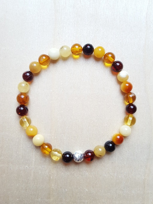 Bracelet de résine fossilisée d'ambre - perles 6 mm - jaune à brun